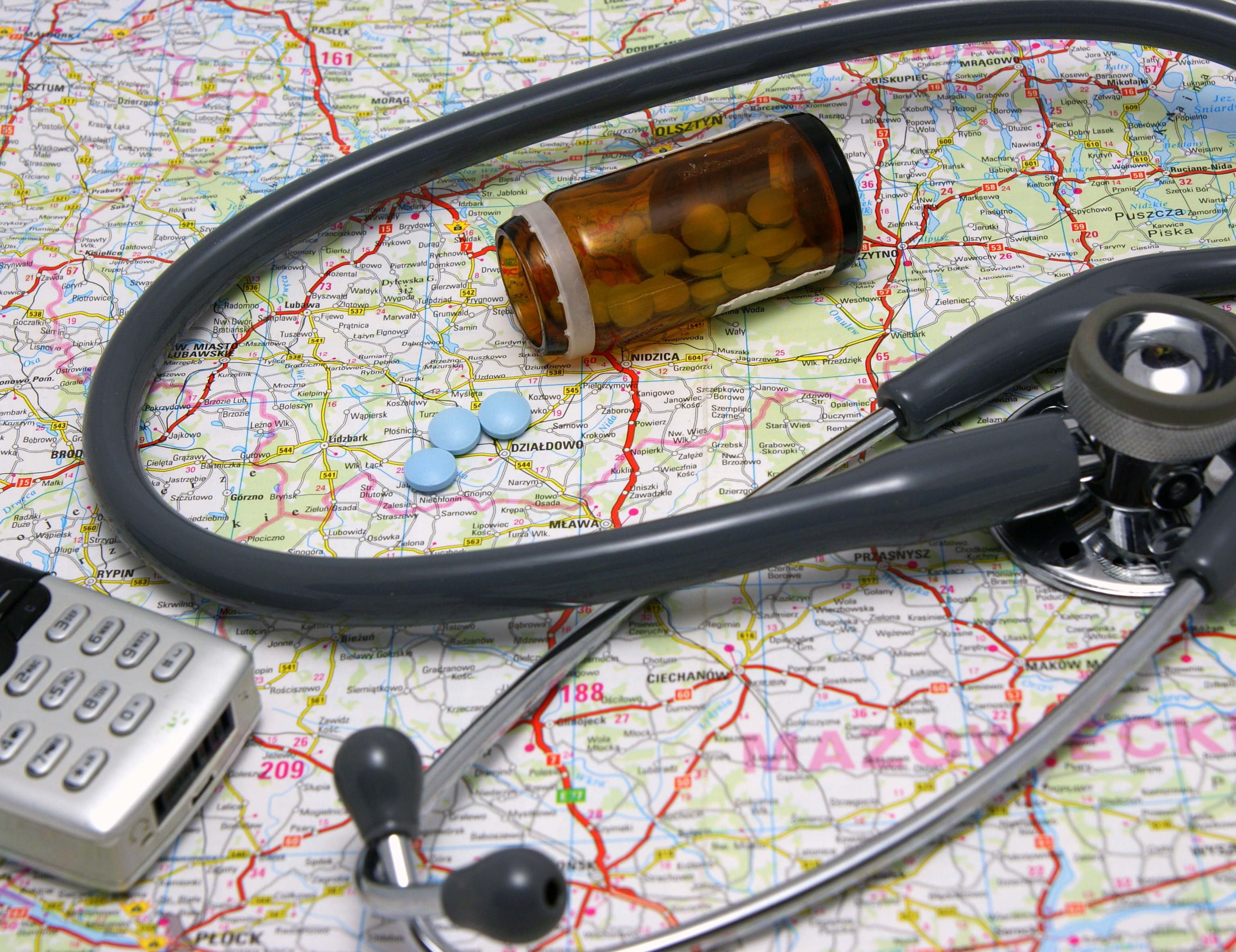 Map, stethoscope, prescription, cell phone